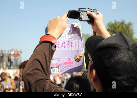 Japanese man using a camera Stock Photo
