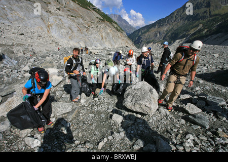 CLEANING OF THE ICE SEA ORGANIZED BY THE FRENCH ALPINE CLUB, CHAMONIX, HAUTE-SAVOIE (74), FRANCE Stock Photo