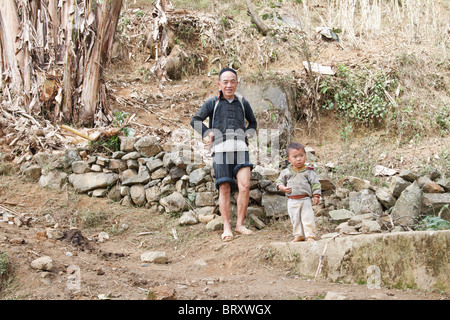 A black Hmong Grandfather with his grandson Stock Photo