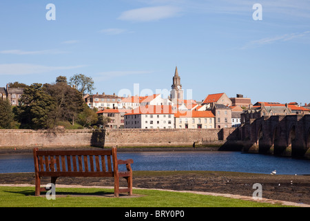 View across the River Tweed to Berwick upon Tweed town waterfront by the old bridge from Tweedmouth Northumberland England UK Britain. Stock Photo