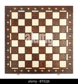 Wooden chess board isolated on white background Stock Photo