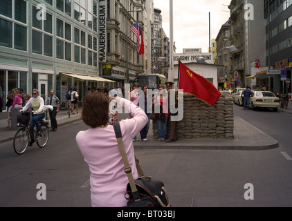 Tourists at Checkpoint Charlie, Berlin, Germany Stock Photo