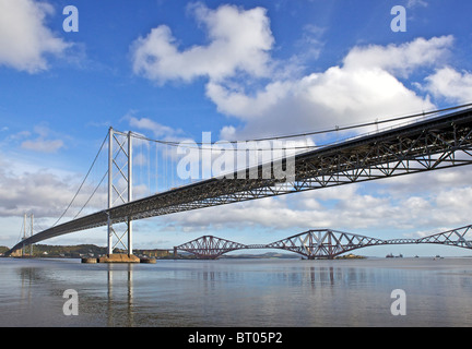 The Forth road and rail bridges seen from the shore at South Queensferry, Edinburgh, Scotland Stock Photo