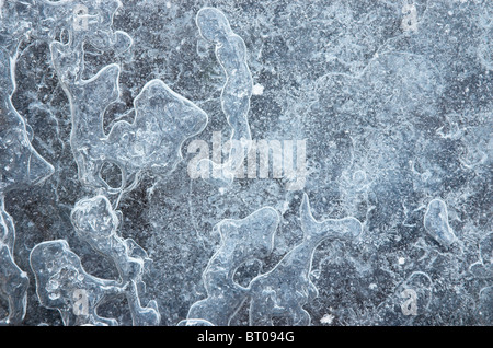 Patterns in Frozen Water on River Stock Photo