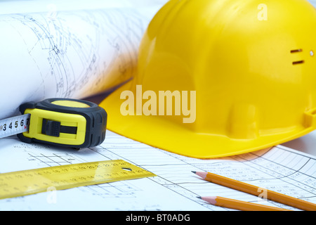 Photo of instruments of builder over plan of house Stock Photo