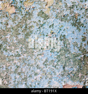 Painted blue peeled surface of wall Stock Photo
