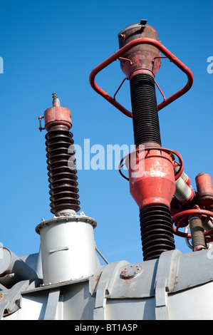 Ceramic high voltage isulators of power station. Stock Photo