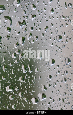 Raindrops on window pane photographed from inside. October 2010 Stock Photo