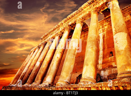 Jupiter's temple ancient Roman columns over sunset, Baalbek, Lebanon Stock Photo