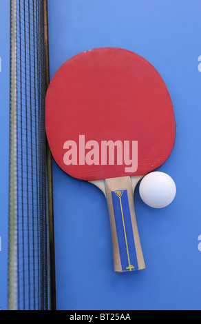 Table tennis bat and ball Stock Photo