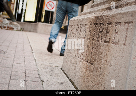 A pedestrian walks in the Sparks Street Mall in Ottawa Stock Photo