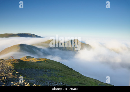 Mountains in the English Lake District above a temperature inversion. Looking toward Hopegill Head and Grasmoor. Stock Photo