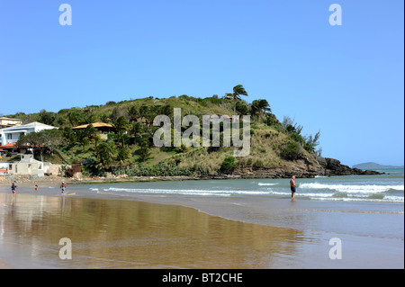 People in the sea at Geriba beach Buzios Stock Photo