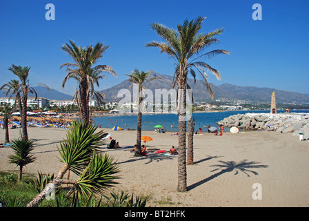 View along the beach, Puerto Banus, Marbella, Costa del Sol, Malaga Province, Andalucia, Spain, Western Europe. Stock Photo