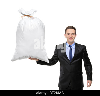 A happy businessman holding a bag with money Stock Photo