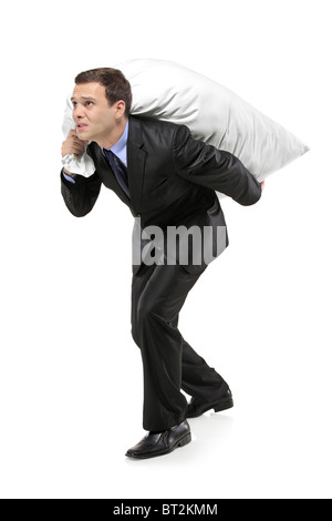 Full length portrait of a businessman carrying a money bag Stock Photo