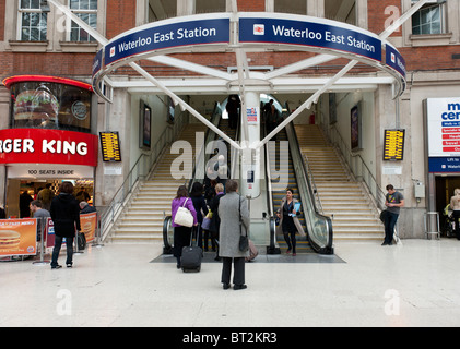 Escalator and stairs leading from the main Waterloo station to Waterloo East station Stock Photo