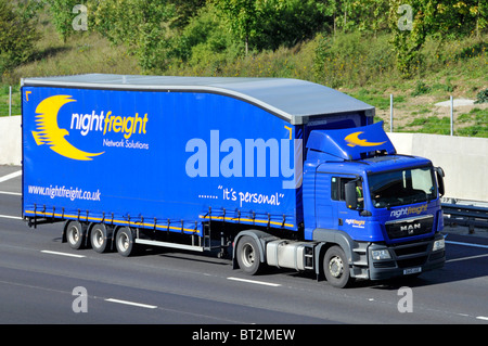 Nightfreight lorry and trailer on the M25 motorway Stock Photo