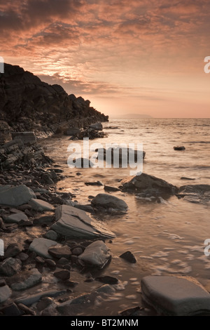 Looking out across the Bristol Channel, from the western end of Kilve Beach. Stock Photo