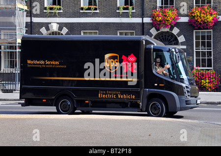 United Parcel Service van UPS zero emission electric delivery vehicle & driver in London England UK Olympic sponsor logo Stock Photo