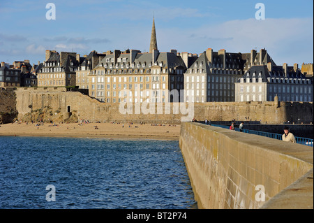 St Malo walled town, - tourists walking in the old town in summer ...