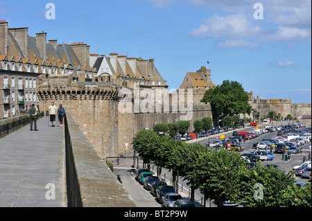 Tourists walking on rampart at Saint-Malo, Brittany, France Stock Photo