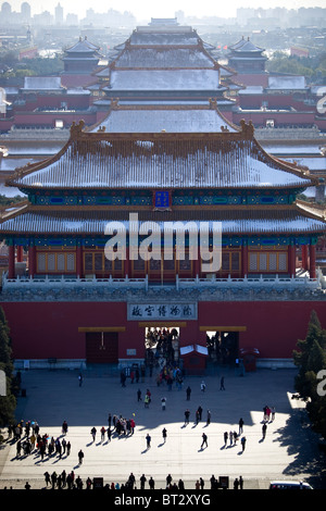 Snow on the roofs of The Forbidden City Beijing China Stock Photo