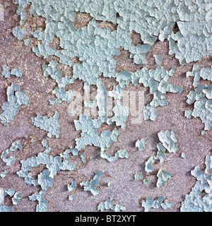 Surface of painted rough blue peeled wall Stock Photo