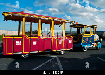 A colourful road train to carry passengers to different areas of ...