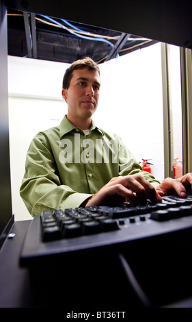 Young IT professional working on a computer in Washington DC Stock Photo