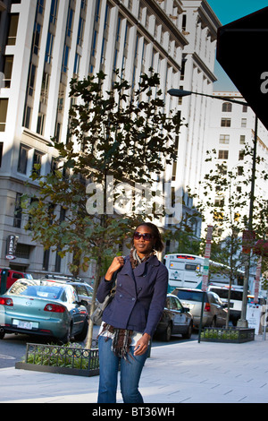 Woman on the go in Washington DC Stock Photo