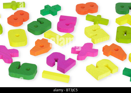 Several multi-colored wooden toy figures isolated on white background Stock Photo