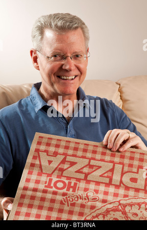 Mature Man with Pizza Delivery Stock Photo