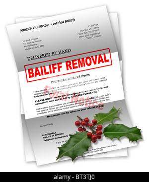 Bailiff letter with Christmas holly on top Stock Photo