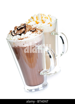Hot chocolate and coffee beverages with whipped cream isolated on white background Stock Photo