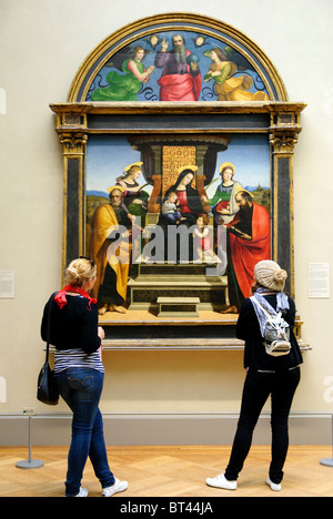 Madonna and Child Enthroned with Saints, ca. 1504, altarpiece by Raphael Stock Photo