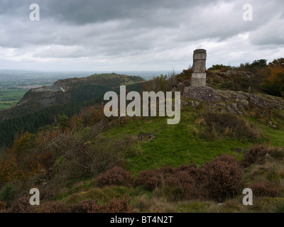 A monument on Moel y Golfa in the Breidden Hills, Powys, mid-Wales. Rodney's Pillar visible on Breidden Hill behind. Stock Photo