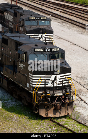 Two Norfolk Southern #9087 & #8919 GE D9-40CW locomotives (train engines) sit in the Dickinson, WV rail yard after refueling. Stock Photo