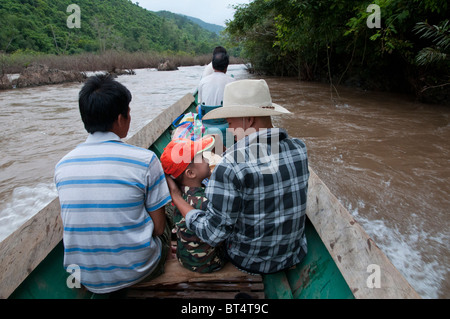 Tail Boat Trip along the Nam Tha River from to Paksa to Na Lae. Northern Laos Stock Photo
