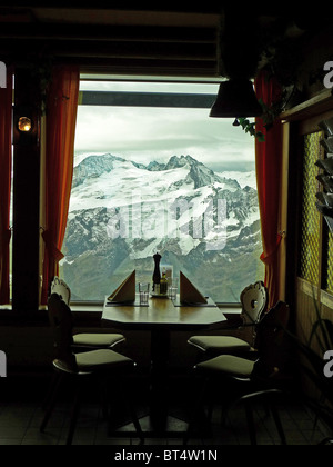 Travel tour tourism vacation holiday visit explore site sight city country Europe train Titlis mountain Switzerland restaurant Stock Photo