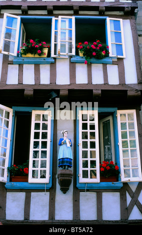 Shuttered windows on a house at Quimper, Brittany Stock Photo