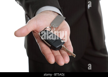 Handing over car keys Stock Photo