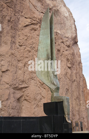 One of the 30-foot tall statues at the Hoover Dam named 'Winged Figures of the Republic' by the sculptor Oskar J.W. Hansen. Stock Photo