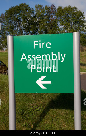 Fire Assembly Point sign outside in a car park Stock Photo