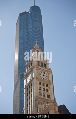 Wrigley building clock tower against the Trump Hotel along Michigan Ave in Chicago, IL, USA. Stock Photo