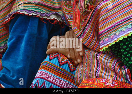 Closeup of hands of an elderly Flower Hmong tribal woman near Sapa, Vietnam Stock Photo