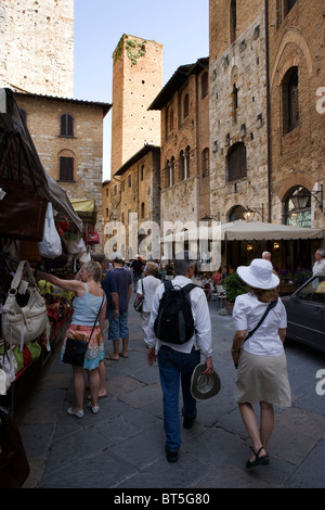 People on a market in San Gimignano, Italy Stock Photo