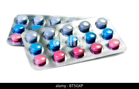 pills in foil blister isolated over white Stock Photo