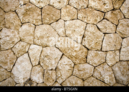 weathered stone wall background or texture Stock Photo