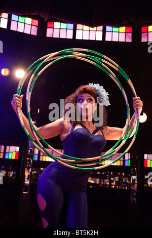 LONDON, ENGLAND, La Soirée cabaret and variety act at the South Bank Big Top, Marawa performing with Hula Hoops Stock Photo